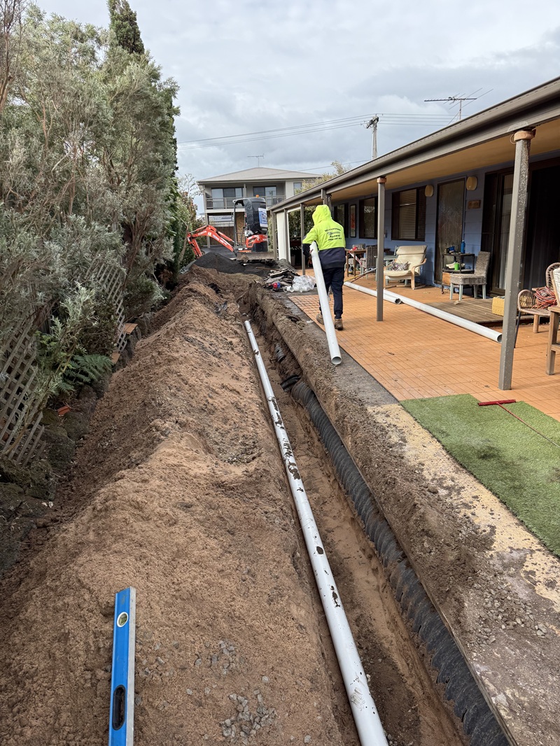 Driveway excavation for a sewer drain connection at Coronet Bay